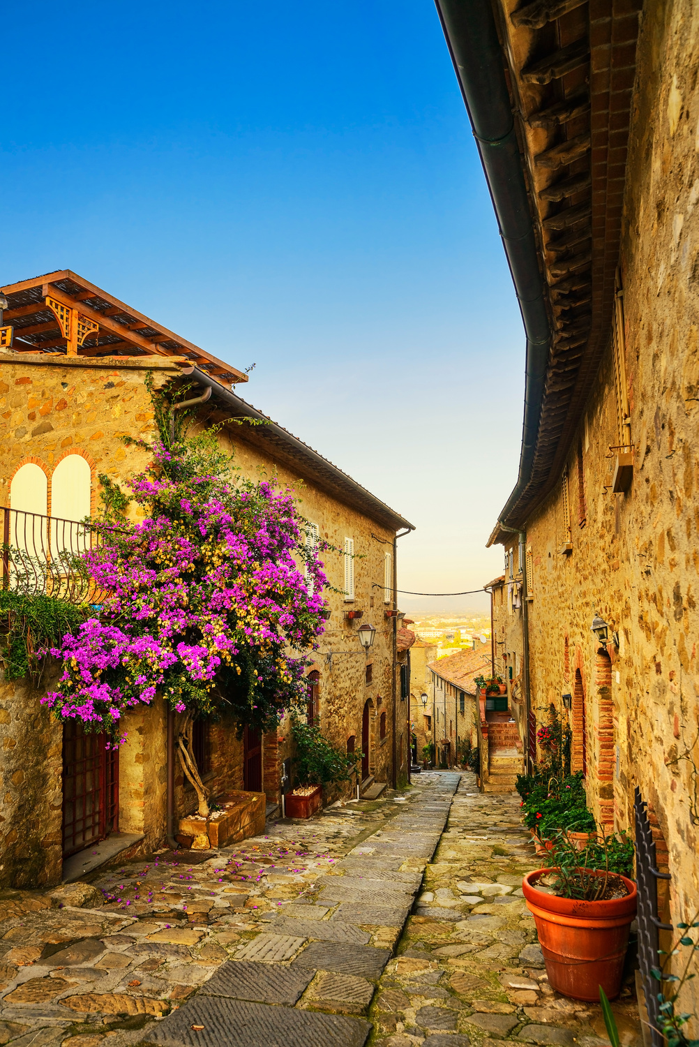 Castiglione della Pescaia, old street on sunset. Maremma Tuscany